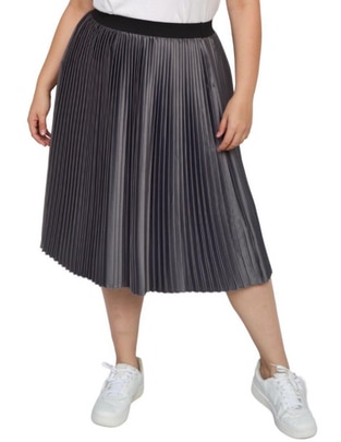 Falda midi media pretina con resorte Falda midi media pretina con resorte