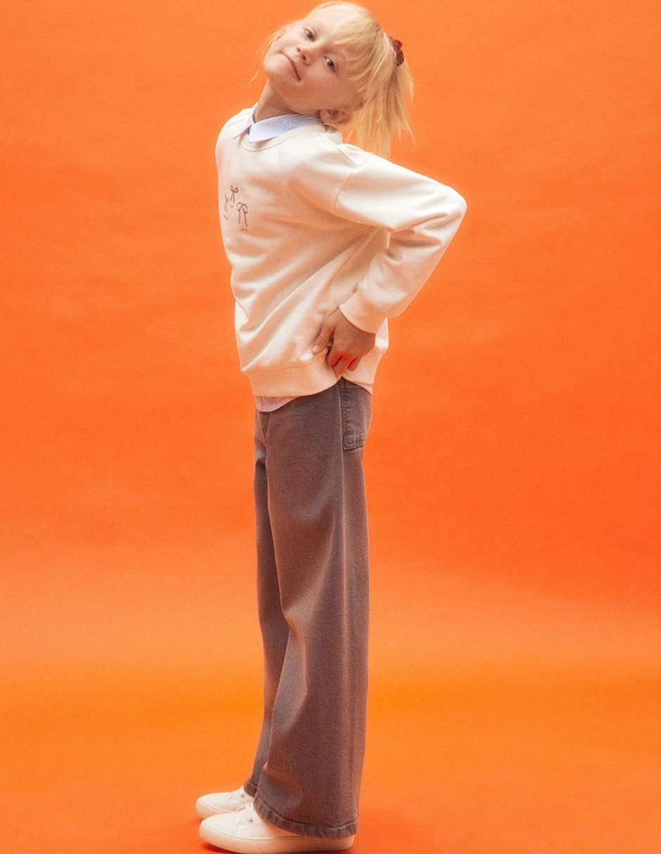 Jeans wide leg deslavado para niña