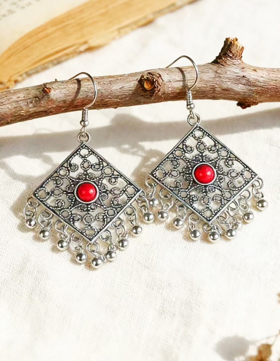 Aretes largos Cowmmerce