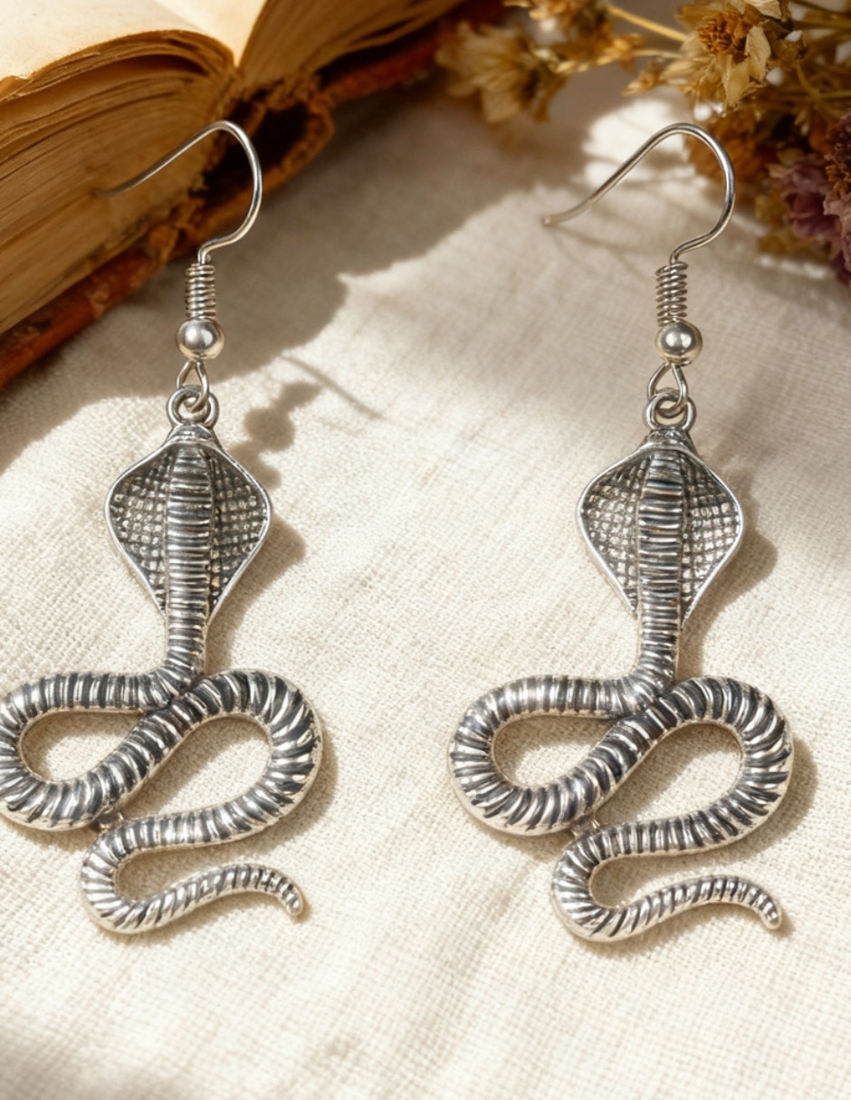 Aretes largos de cobra
