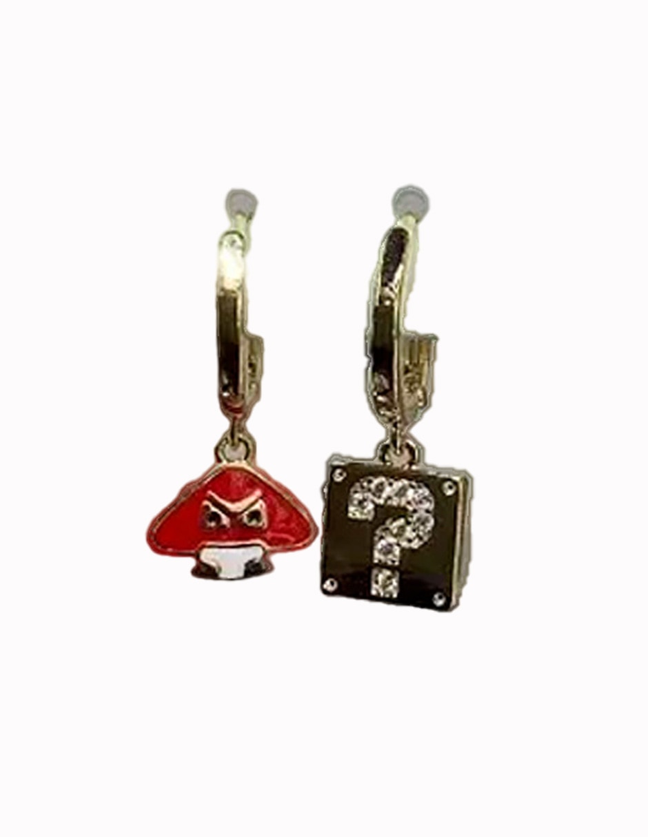 Set de aretes de diferentes formas nira de oro laminado 10 k con acabado baño de oro zirconia cÏbica