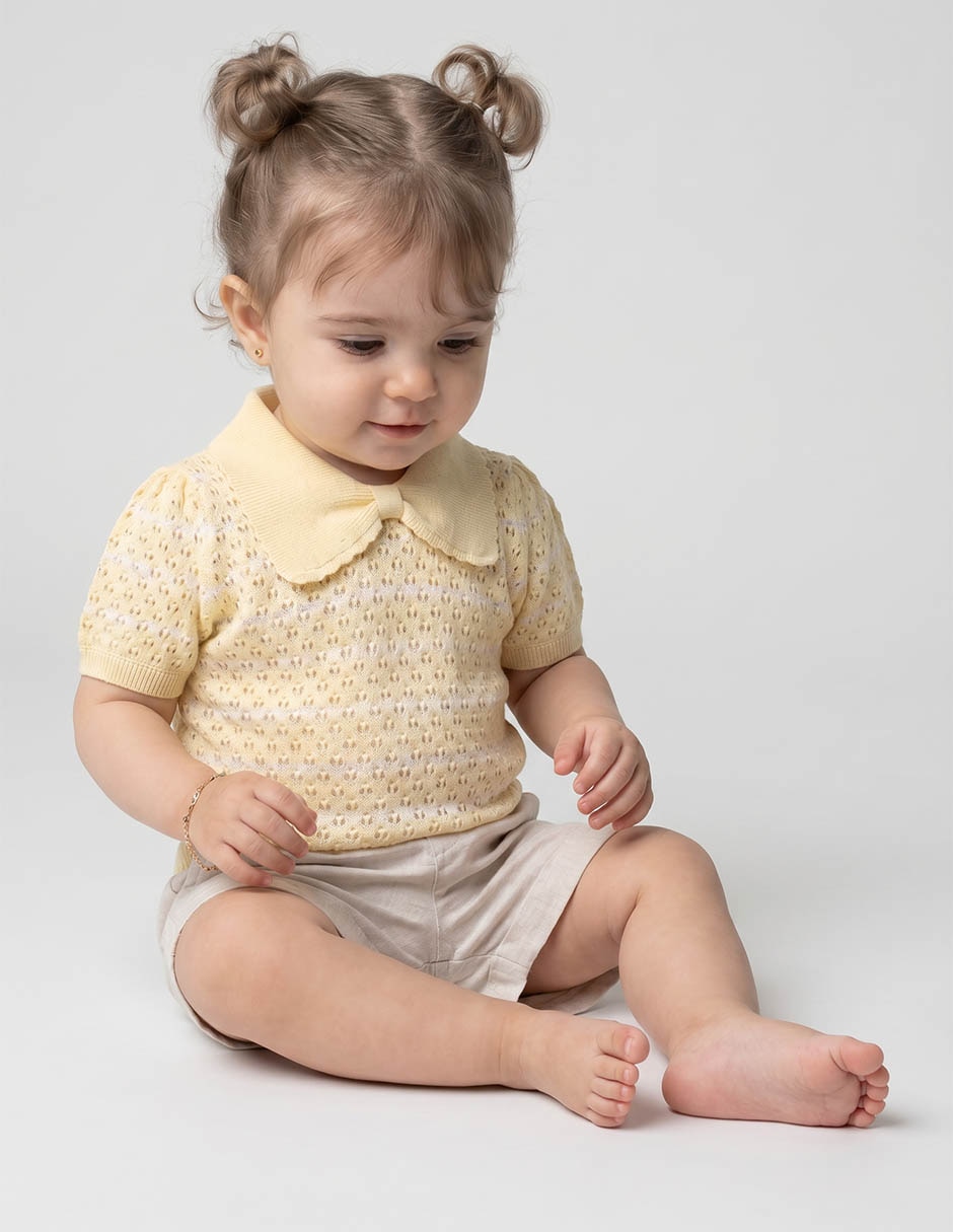 Blusa regular a rayas para niña