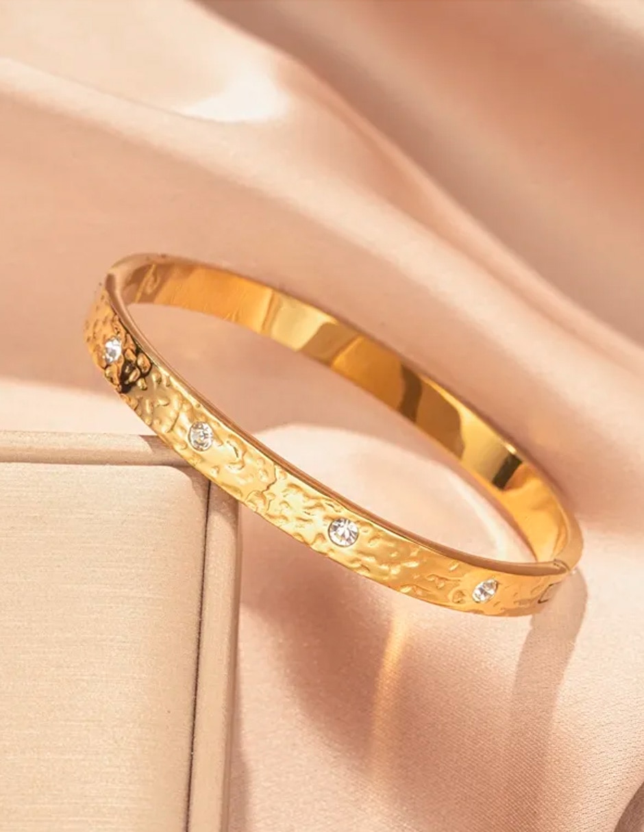 Brazalete Nira de oro laminado con zirconia cúbica 14 k acabado brillante