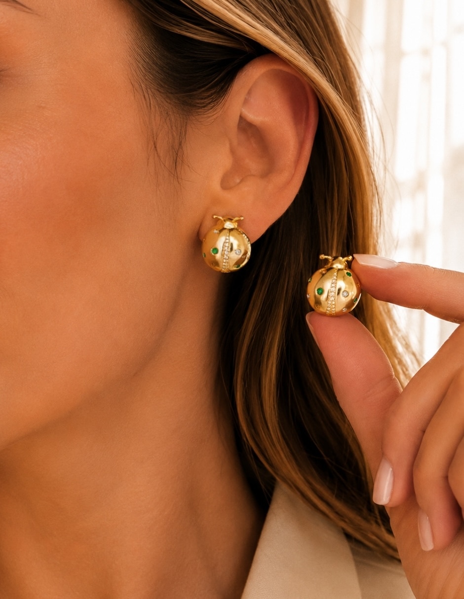 Broqueles de catarina nubia con acabado baño de oro zirconia 8