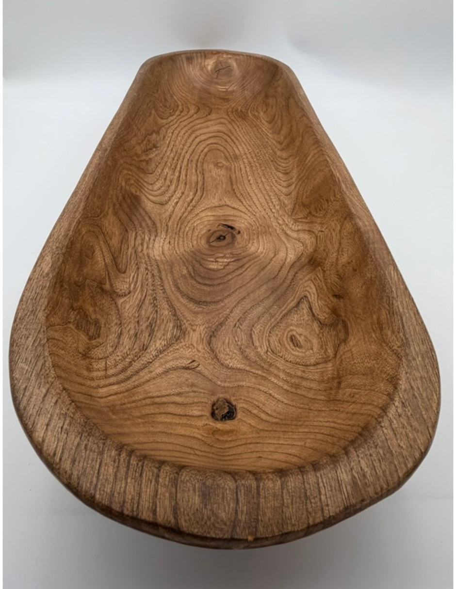 Escultura de madera teca